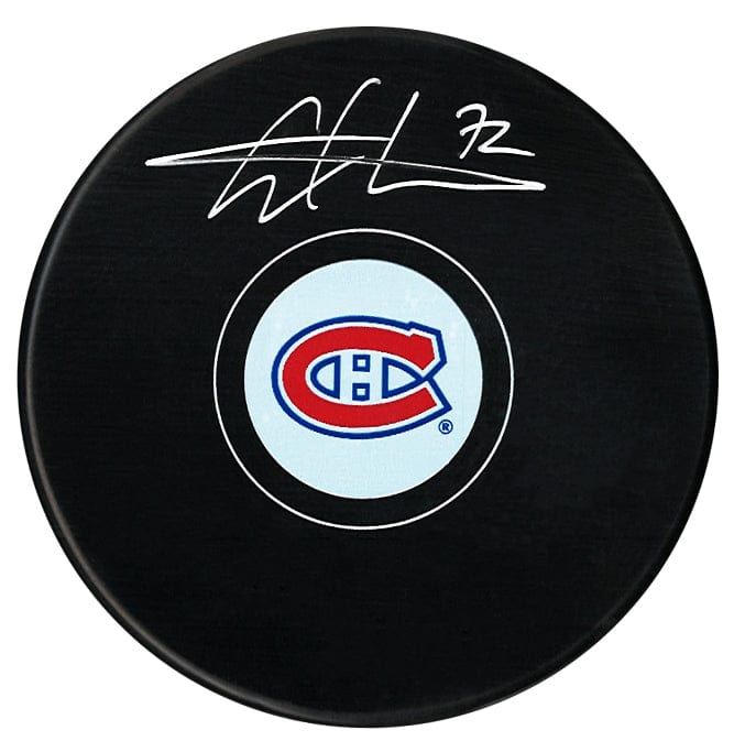 Arber Xhekaj Autographed Montreal Canadiens Puck CoJo Sport Collectables Inc.