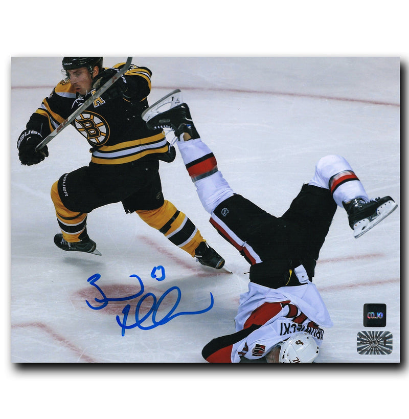 Brad Marchand Boston Bruins Autographed Big Hit 8x10 Photo CoJo Sport Collectables Inc.