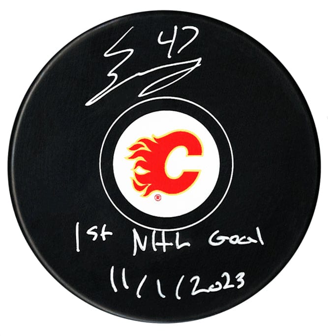Connor Zary Autographed Calgary Flames 1st Goal Inscribed Puck CoJo Sport Collectables Inc.