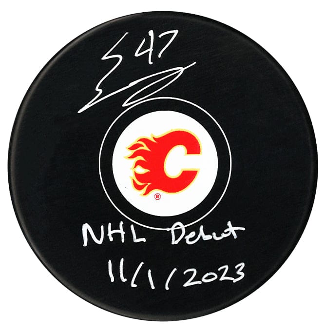 Connor Zary Autographed Calgary Flames Debut Inscribed Puck CoJo Sport Collectables Inc.
