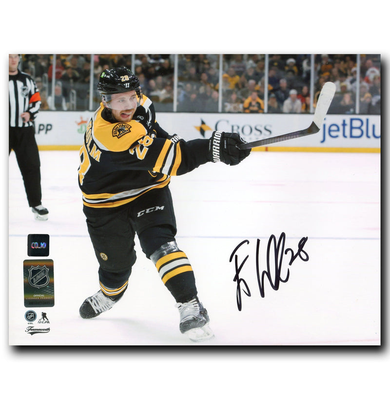 Elias Lindholm Boston Bruins Autographed Shooting 8x10 Photo CoJo Sport Collectables Inc.
