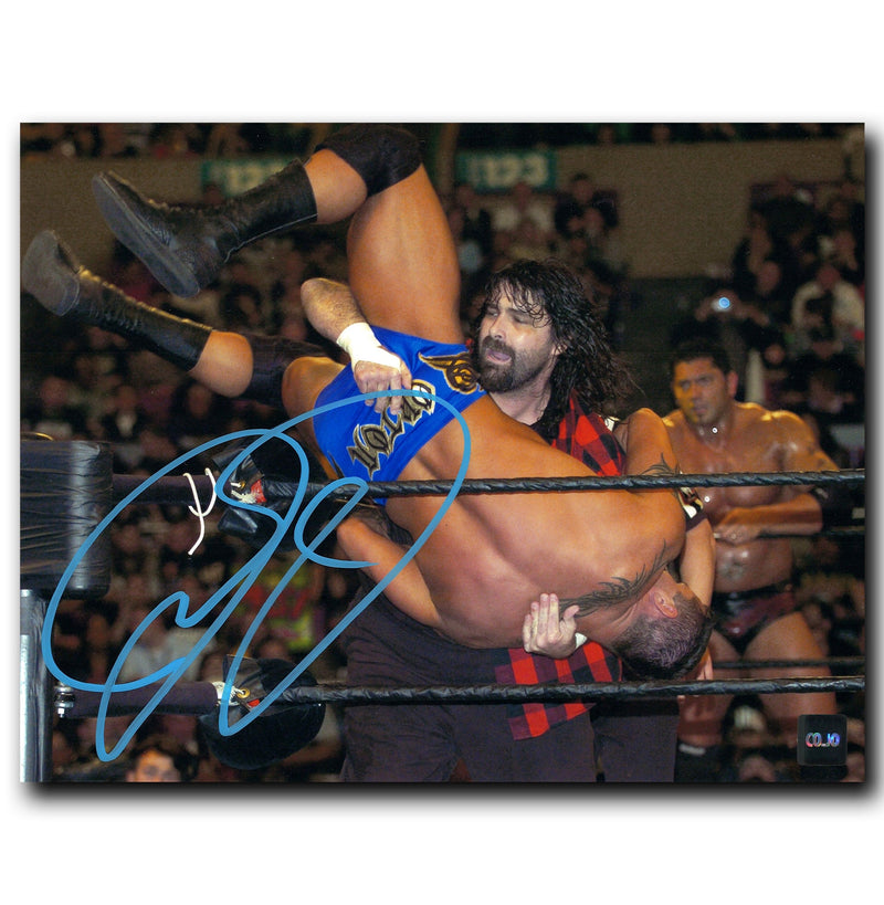 Mick Foley WWE Autographed Action 8x10 Photo CoJo Sport Collectables Inc.