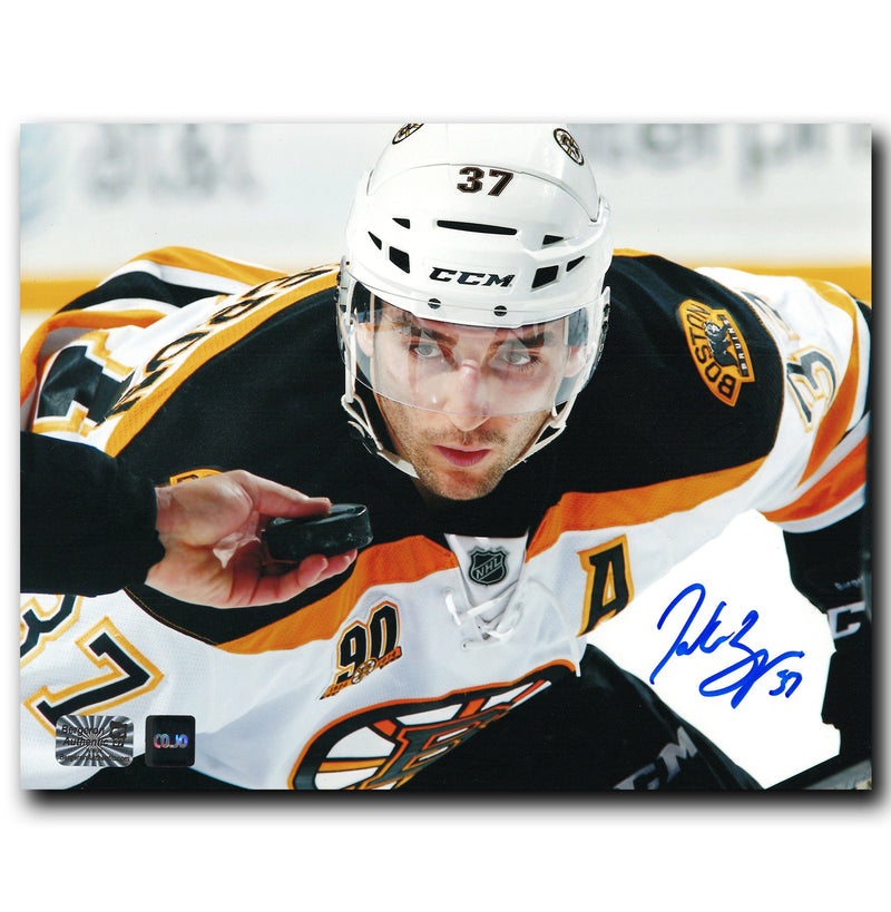 Patrice Bergeron Boston Bruins Autographed Puck Drop 8x10 Photo CoJo Sport Collectables Inc.