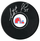 Stephane Fiset Autographed Quebec Nordiques Puck - CoJo Sport Collectables Inc.