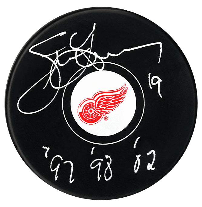 Steve Yzerman Autographed Detroit Red Wings Stanley Cup Years Inscribed Puck (Small Logo)