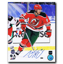Adam Henrique New Jersey Devils Autographed Stadium Series 8x10 Photo.