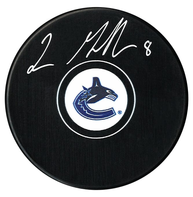Conor Garland Autographed Vancouver Canucks Puck CoJo Sport Collectables Inc.