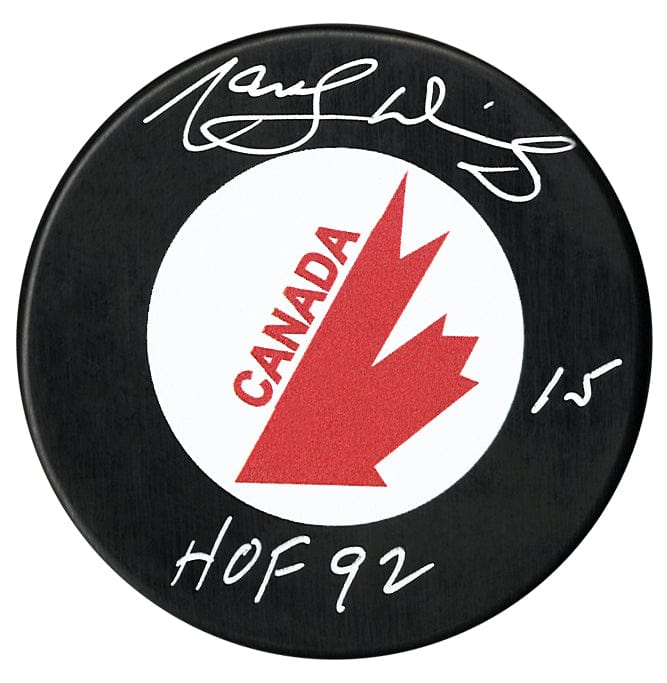 Marcel Dionne Autographed Canada Cup HOF Inscribed Puck CoJo Sport Collectables Inc.