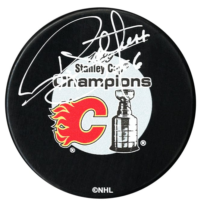 Ric Nattress Autographed Calgary Flames 1989 Stanley Cup Champions Puck CoJo Sport Collectables Inc.