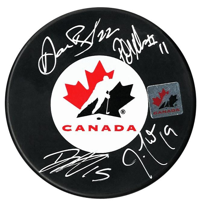 Thornton, Marleau, Boyle, and Heatley Autographed 2010 Team Canada Olympic Puck CoJo Sport Collectables Inc.