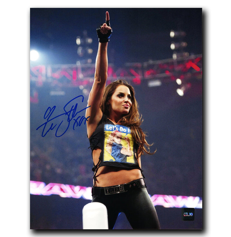 Trish Stratus WWE Autographed Action 8x10 Photo CoJo Sport Collectables Inc.