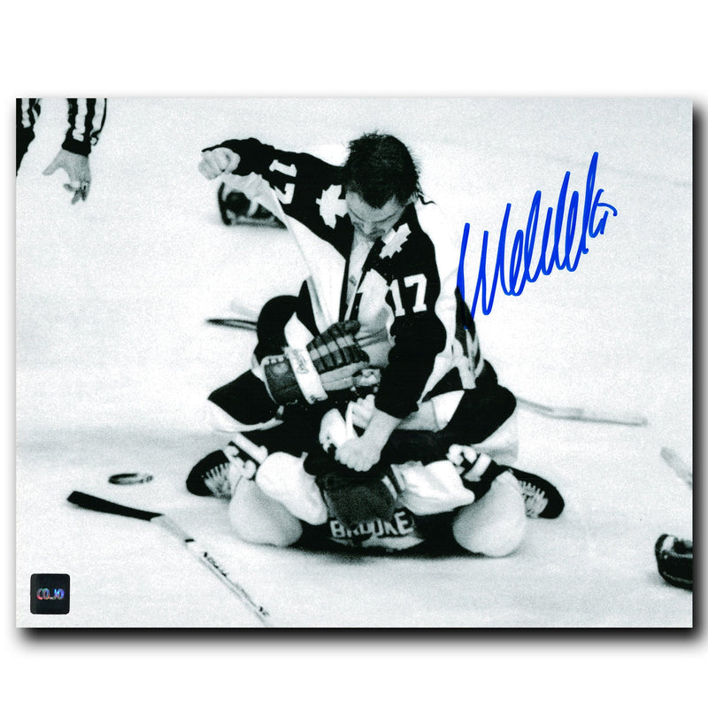 Wendel Clark Toronto Maple Leafs Autographed Punching 8x10 Photo CoJo Sport Collectables